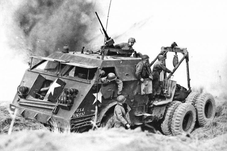 M25 tank transporter under German artillery fire, Western Front, 1944