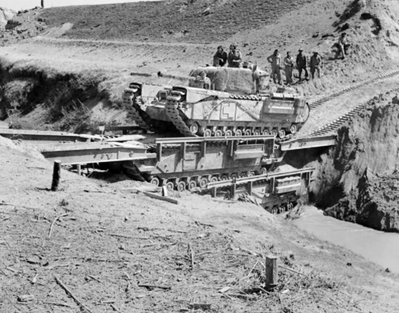 Churchill Mk IV of North Irish Horse crossing the Senio River over two Churchill Ark, April 1945