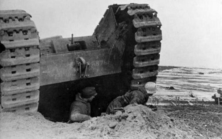 German soldiers taking cover behind Soviet Churchill, Eastern Front