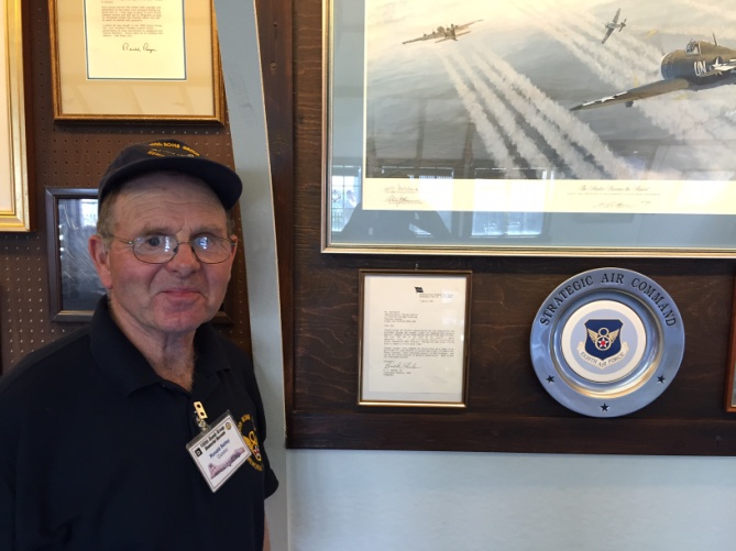 Ron Bately with the letter and plate presented to the 100th Museum by General “Buck” Shuler in 1990.