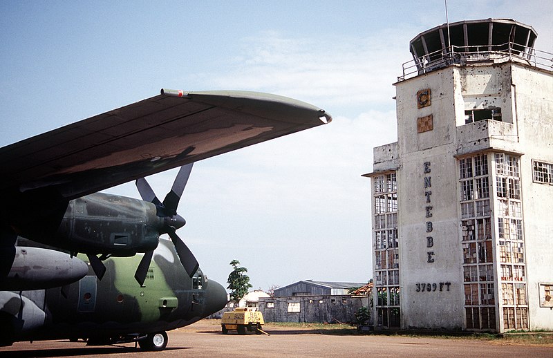 Airport terminal with U.S. C-130 Hercules. Bullet holes are still visible from the 1976 raid.