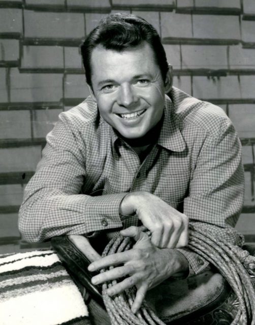 Photo of Audie Murphy as Tom Smith from the television program Whispering Smith.