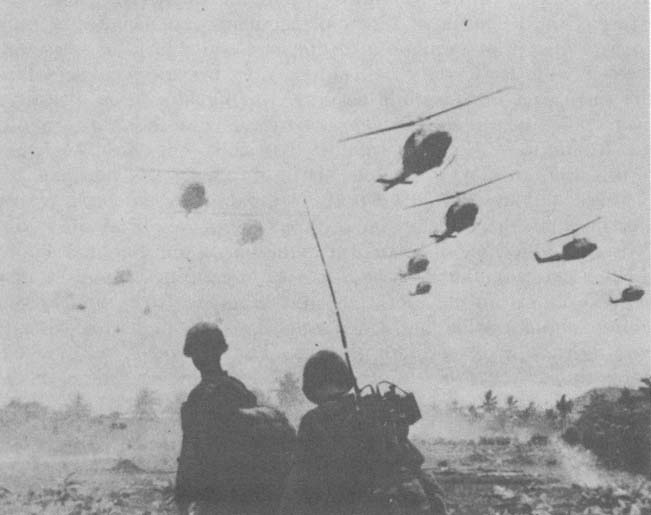 Awaiting the second wave of combat helicopters on an isolated landing zone during Operation Pershing.