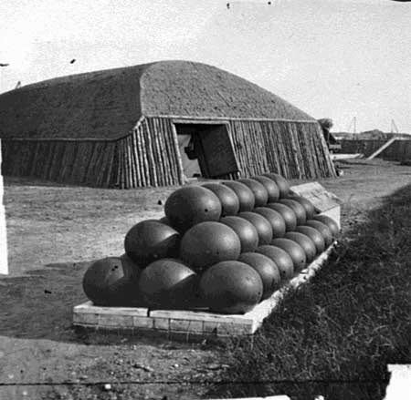 Photograph showing ammunition stacked up outside of the magazine at Battery Rodgers in Alexandria, Virginia, during the American Civil War.