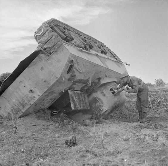 Tipped over British Sherman III (M4A2)