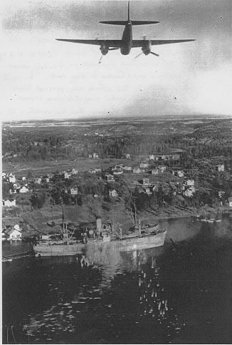 Mosquito aircraft in at low level attacking two armed merchantmen In Norwegian Fjord with cannon and rocket fire, 4th April 1945