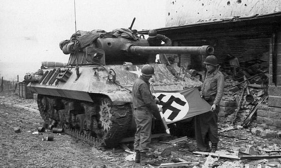 M36 destroyer crew with a German swastika flag