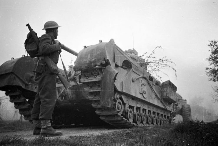 Churchill Mk VII Crocodile tank and NZ soldier Senio River Italy April 1945