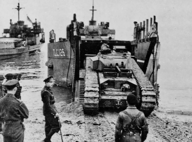 Churchill tank unloads in England 1943