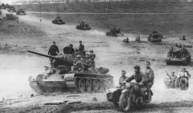 Column of Soviet Troops including several T-34s.