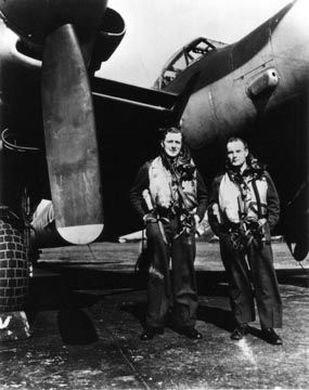 RAF nightfighter pilot Eric Loveland and navigator Jack Duffy standing in front of their Mosquito March 1945.