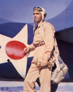 O’Hare stands beside a F4F-3 Wildcat.