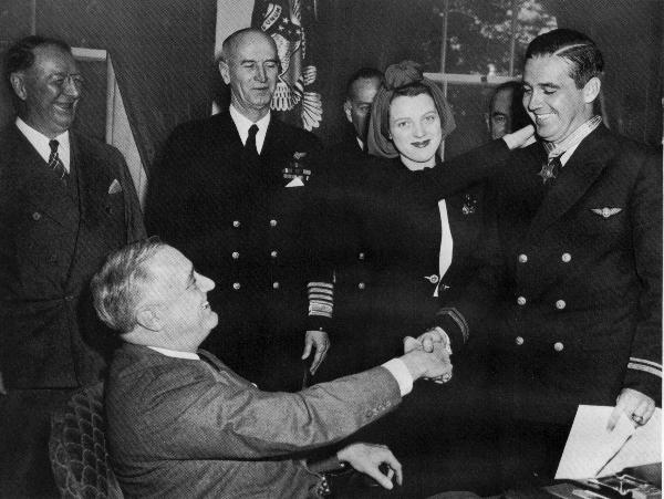 Medal of Honor presentation on April 21, 1942: President Roosevelt, Frank Knox, Secretary of the Navy (behind FDR), Admiral Ernest King, Edward O’Hare and his wife Rita.