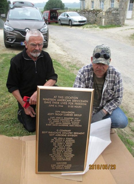 Francis Julien and Eric Leboeuf show the group the new plaque.