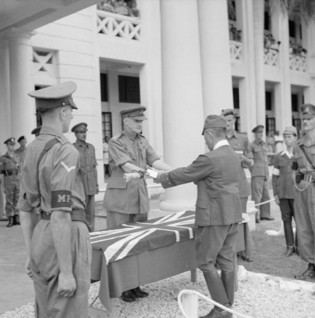 The surrender ceremony of the Japanese to the British forces with General Itagaki surrendering his sword to General Frank Messervy at Kuala Lumpur, British Malaya on February 22, 1946.