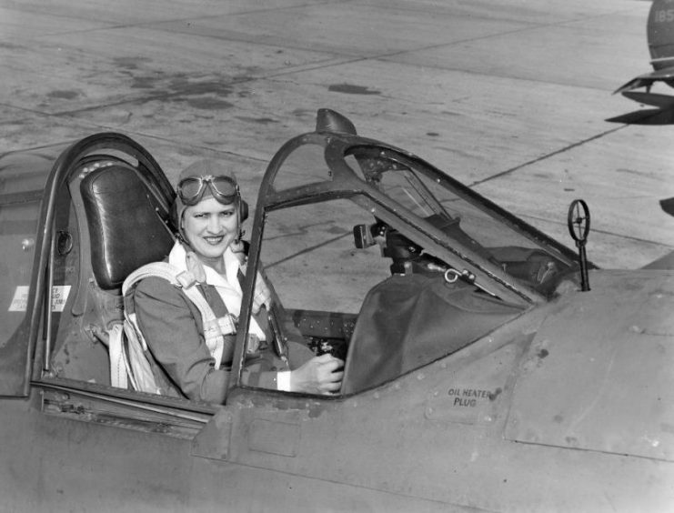 Pioneer American aviator Jacqueline “Jackie” Cochran in the cockpit of a Curtiss P-40 Warhawk fighter plane.