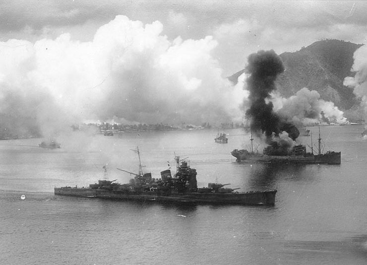 Japanese cruiser Haguro and cargo ships under attack at Rabaul.