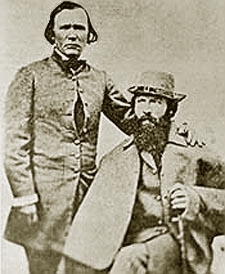 John C Fremont (seated) and Kit Carson