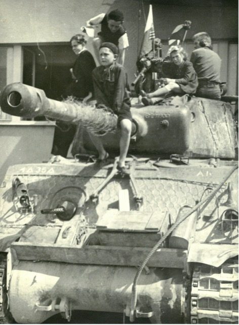 Kids on tank. Photo: Jerry Huffman