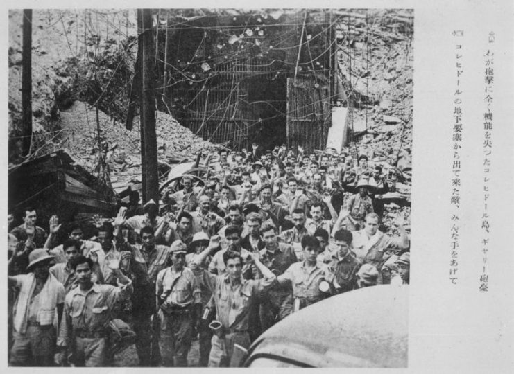 U.S. and Filipino soldiers and sailors surrendering to Japanese forces at Corregidor