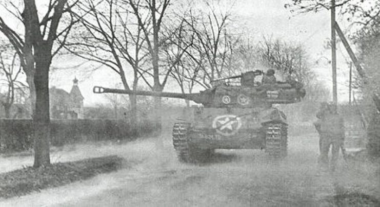 M18 Hellcat of the 824th Tank Destroyer Battalion in action at Wiesloch, Germany, April 1945.