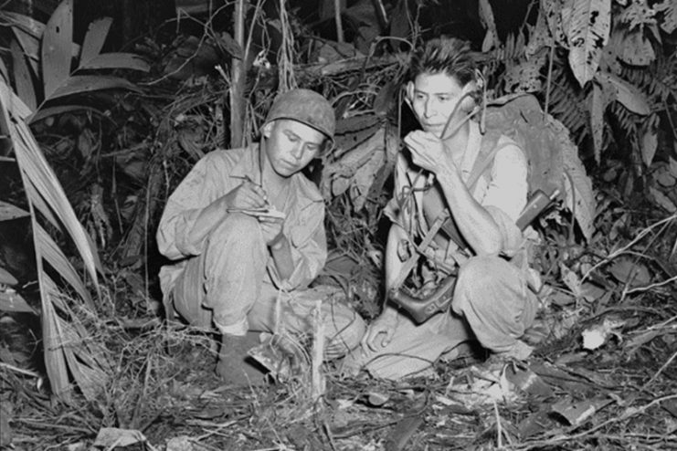 Navajo Code Talkers Marine Corps Cpl. Henry Bake, Jr. and Pfc. George H. Kirk use a portable radio near enemy lines to communicate with fellow Marines in December 1943. The Navajo language proved to be an unbreakable military code that assisted Navy and Marine operations in the Pacific during World War II. The secret of the Navajo Code Talkers and the use of the Navajo language would not be revealed until the late 1960s. National Archives and Records Administration photo
