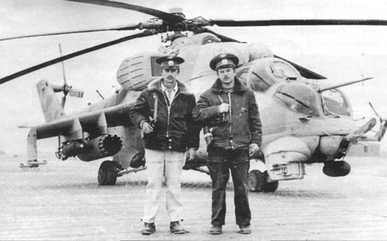 Soviet Mi-24 with pilot and weapons officer.