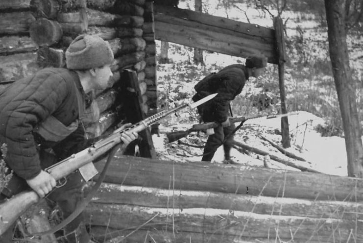 Soviet Soldiers with SVT-40 rifles.