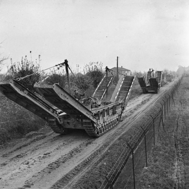 Churchill ARK bridgelaying tanks passing through Forli, 9 November 1944.