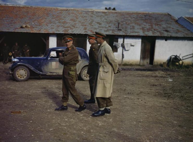 The Commander of the 1st Army, Lieutenant General K A N Anderson, CB, MC, (right) during a visit to a forward divisional headquarters on the Tunisian front.