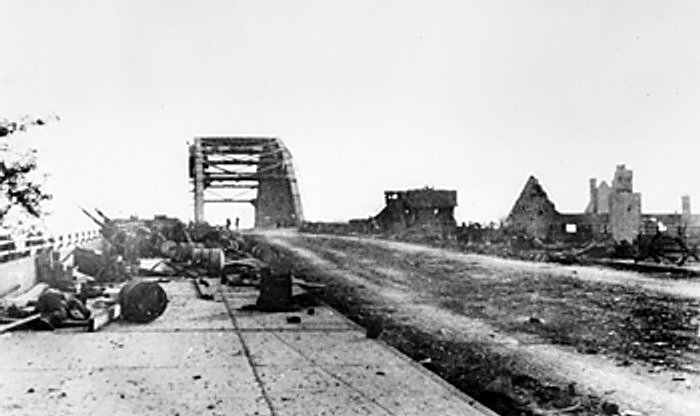 The Arnhem Bridge after Frost’s force had been overrun and the road cleared. Notice the destroyed buildings on the right.