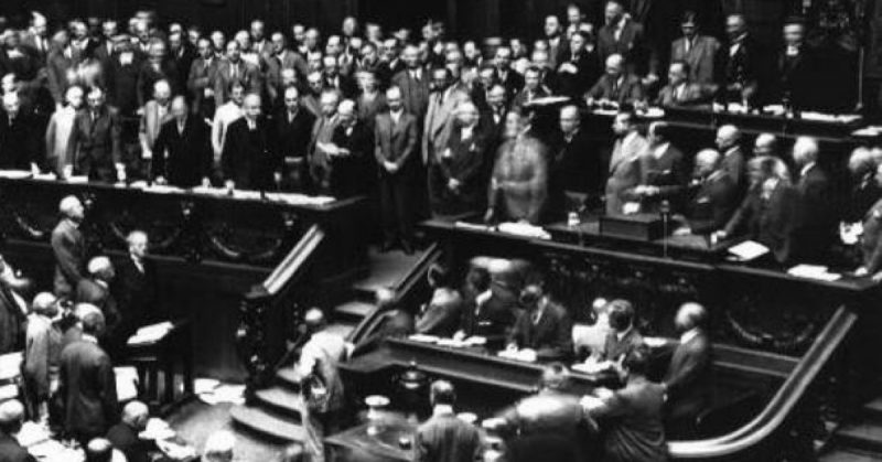 Chancellor Heinrich Bruening announces to the Reichstag (German parliament) President Hindenburg's order for its dissolution and for new elections, invoking powers granted to him under the Weimar Constitution. Berlin, Germany, July 18, 1930.