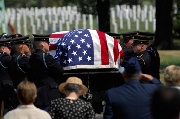 Army Color Guard members carry the casket of 2nd Lt. Harold E. Hoskin into the Fort Myer Old Post Chapel before the start of his funeral procession Sept. 7 at Arlington National Cemetery in Virginia. Lieutenant Hoskin was one of five men who were flying in a B-24 Liberator that crashed while on a test flight Dec. 21, 1943, out of Ladd Field in Fairbanks, Alaska. Lieutenant Hoskin’s remains were discovered in August 2006 and identified in April 2007. (U.S. Air Force photo/Tech. Sgt. Cohen A. Young)