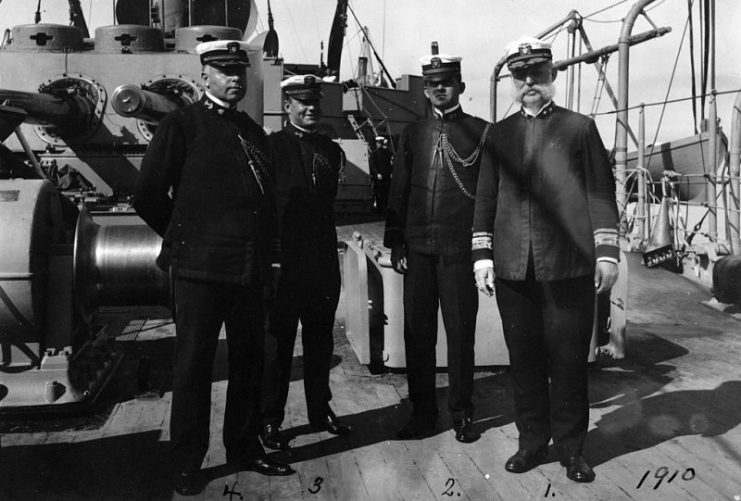 USS California (ACR 6) at San Francisco, California, October 1911. Shown (left to right)- Rear Admiral Thomas Chauncey; Ensign Beauregard; Ensign D.H. Howard; and Commander W. J. Terhune. California was renamed San Diego during WWI and was sunk by a German mine off Long Island, New York, on July 18, 1918.