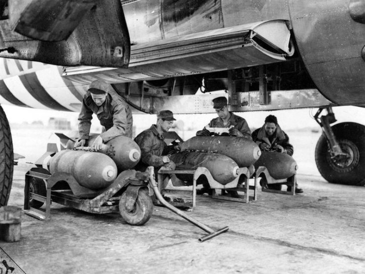 Loading bombs in B-26 Marauder on D-Day.