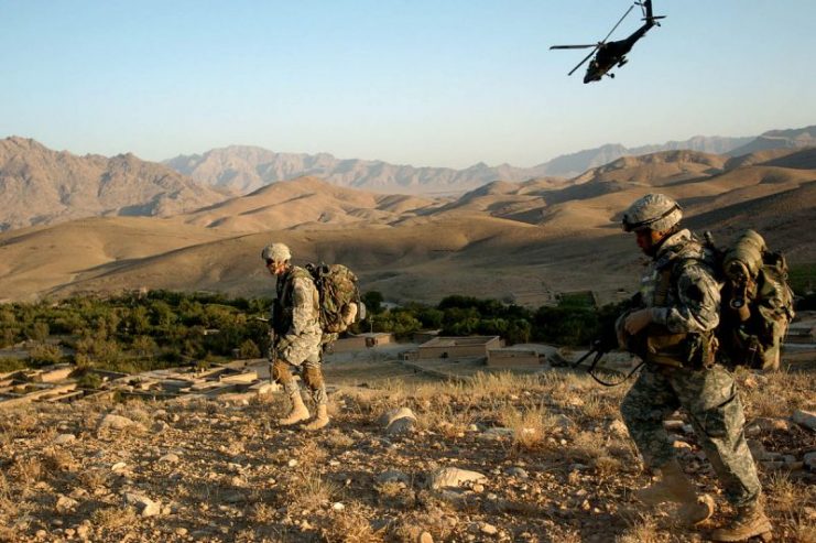 An Apache helicopter provides protection from the air, October 2005, Afganistan