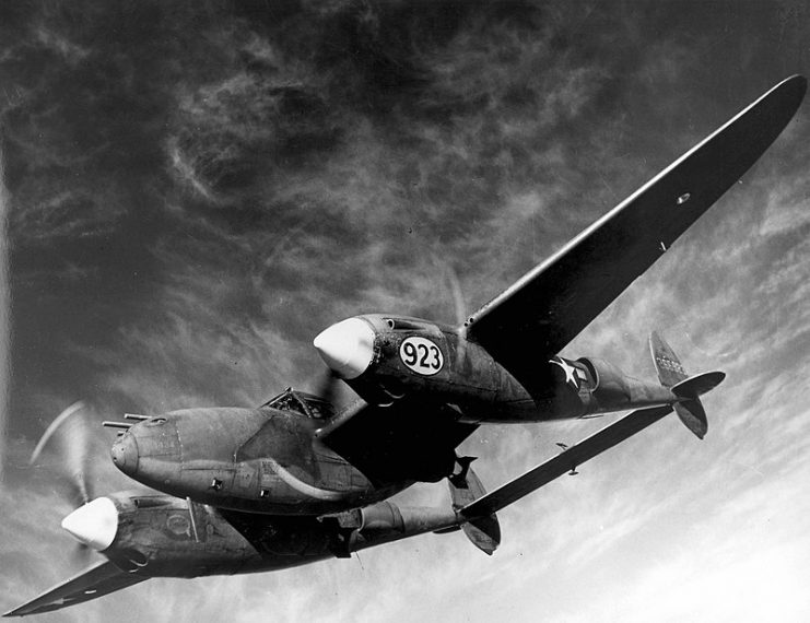 Barely visible beneath the wings of a Lockhead P-38 Lighting are the deadly bombs with which this multi-purpose plane can blast enemy troops, ships and gun emplacements. As shown in recent demonstartions at the AAF Tactical Center, Orlando, Fla., the Lockhead P-38, now being used as a fighter-bomber, is capable of carrying bomb pay loads up to 2,000 pounds, thus affording the Allies another potent weapon for use against Germany and Japan in coming offensive.
