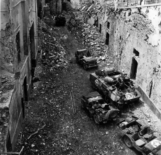 5th Army M8 Nina Chiquita Armored Car and Jeeps in Gaeta Italy May 20 1944.