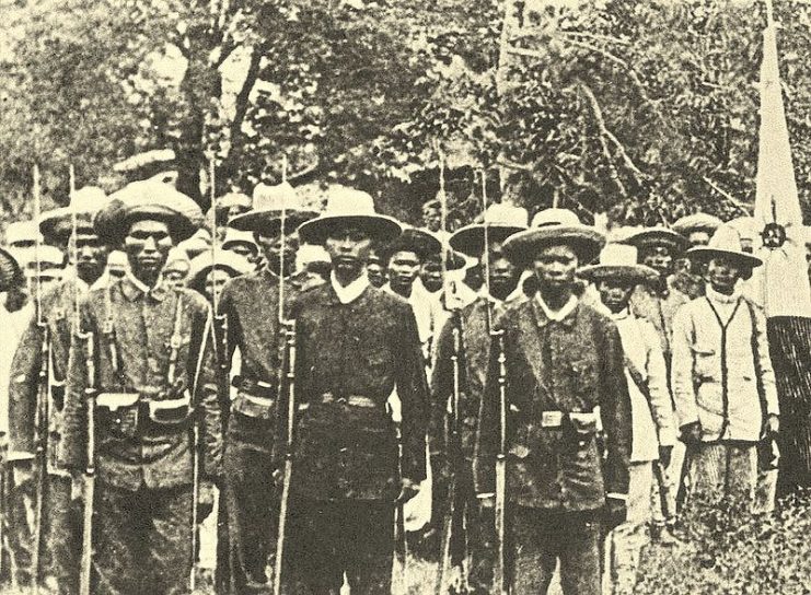 A late 19th century photograph of armed Filipino revolutionaries, known as the Katipuneros.1898