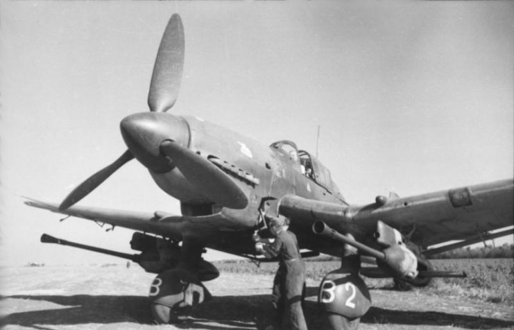 Junkers Ju 87 “Stuka” dive bomber with 3.7 cm anti-tank guns under the wings. The aircraft, Hans-Ulrich Rudel’s, is being started with a hand crank. Photo: Bundesarchiv, Bild 101I-655-5976-04 / Grosse / CC-BY-SA 3.0