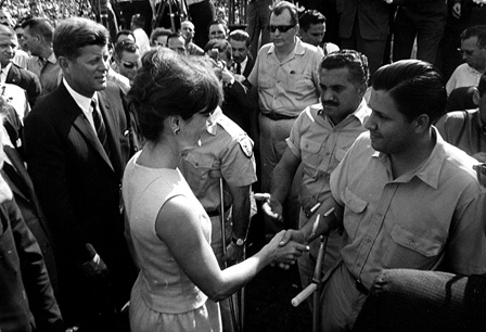 John F. Kennedy and Jackie Kennedy greet members of the brigade at the Orange Bowl