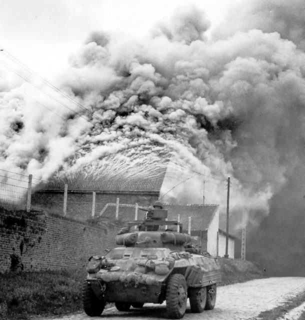 M8 Greyhound Armored Car in Action Belgium Sept 1944.