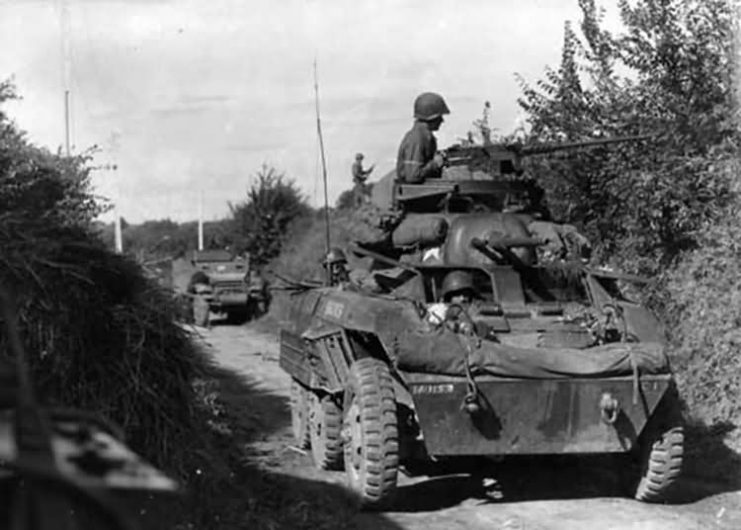 M8 Greyhound of 113th Cav Recon Squadron Spearheads 1st Army Drive into Holland September 1944.