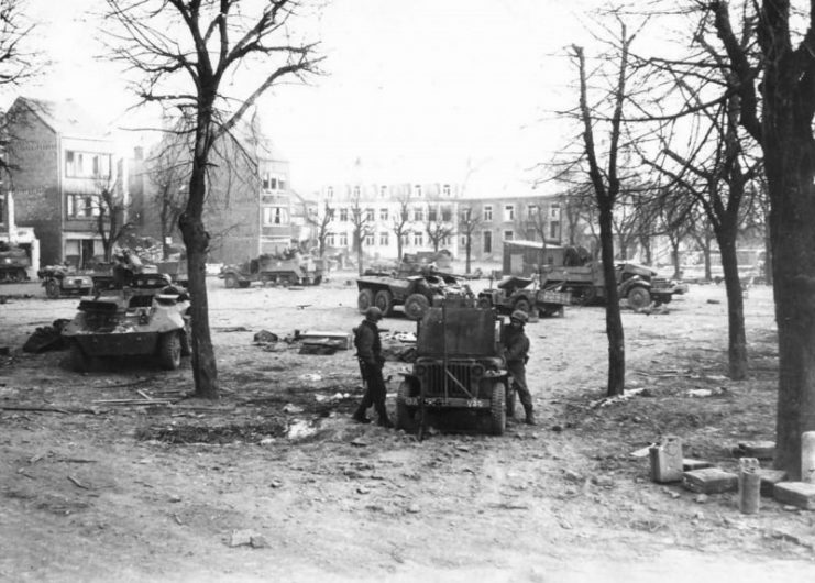 M8 Greyhounds of the 4th and 10th Armored Division in Bastogne.
