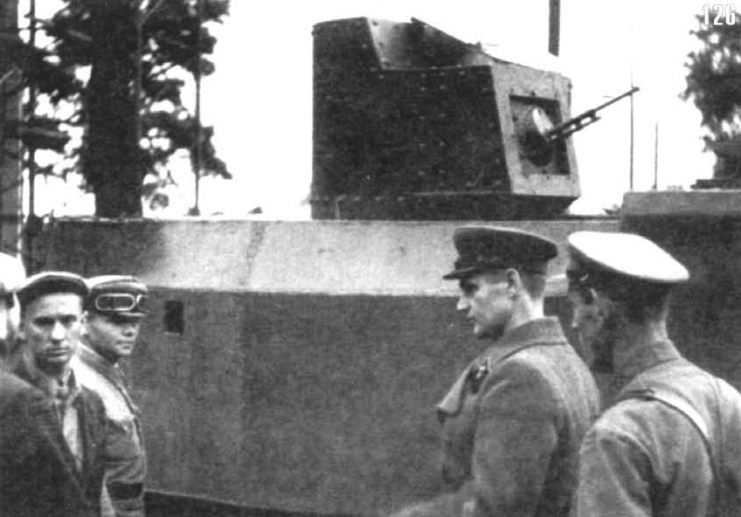 Factory workers and military officers next to the STZ-5 armored tractor “Tank NI”. Odessa, Ukraine. August 1941.