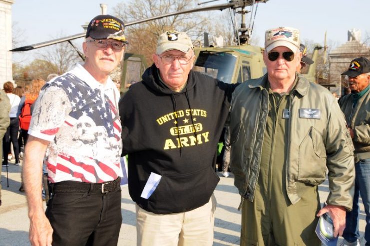 Larry Earles, left, and Lawrence Lanier, right, both served as helicopter pilots during the Vietnam War. Dave Hause, center, served as a helicopter crew chief during the war. All three attended the dedication of the Vietnam Helicopter Pilot and Crewmember Monument at Arlington National Cemetery in Washington, D.C., April 18, 2018. (Photo Credit: U.S. Army photo by C. Todd Lopez)
