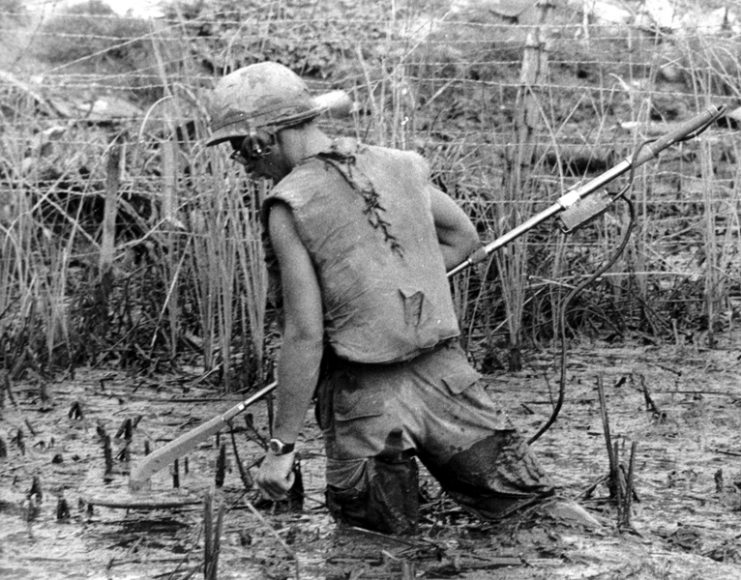 Mine detection through a rice paddy.