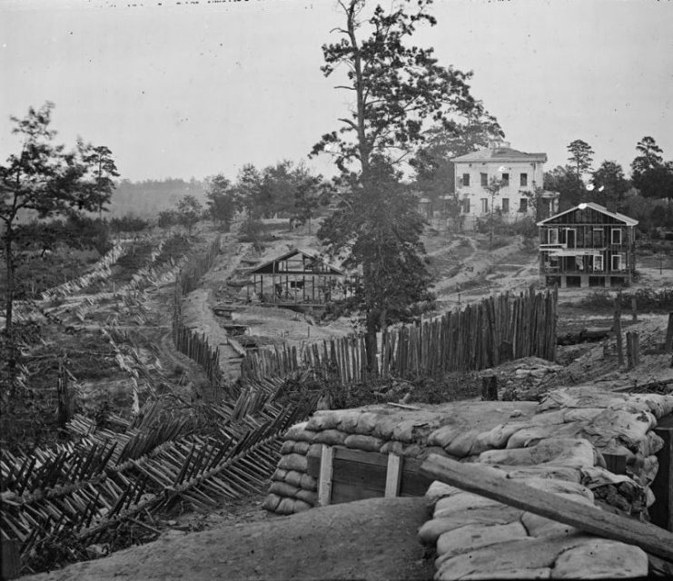 Palisades and chevaux de frise in front of the Potter (or Pondor) House, Atlanta, Georgia, 1864.