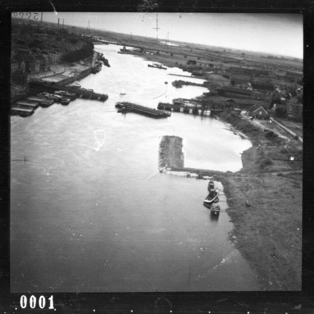 In the background: the road bridge at Arnhem, looking east. The picture was taken on September 6th, 1944.