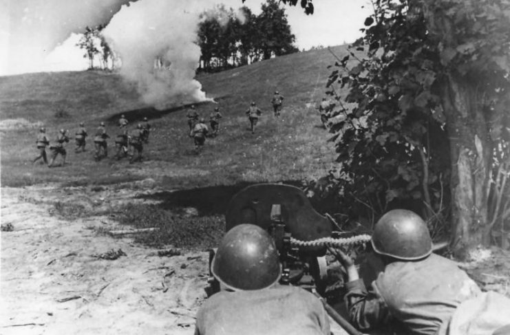 Soviet Troops Advance under the Cover of a Maxim Machine Gun.